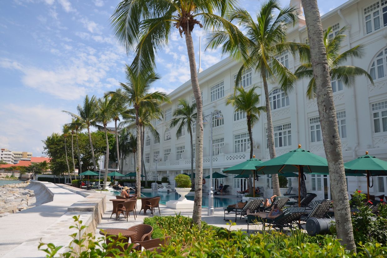 Pool area of the Eastern & Oriental Hotel in Penang, Malaysia. Credit: Cmglee