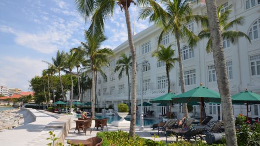 Pool area of the Eastern & Oriental Hotel in Penang, Malaysia. Credit: Cmglee